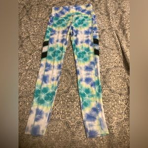 Blue and green tie-Dye leggings with full size pockets on both sides of legs.